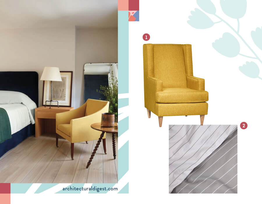 Dormitorio moderno con cama con cubrecama liso y una poltrona amarillo mostaza
